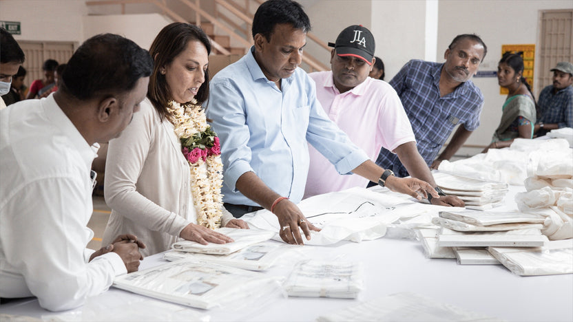Hayden Hill visiting the manufacturing facility in India to discuss new designs for their garment storage bags