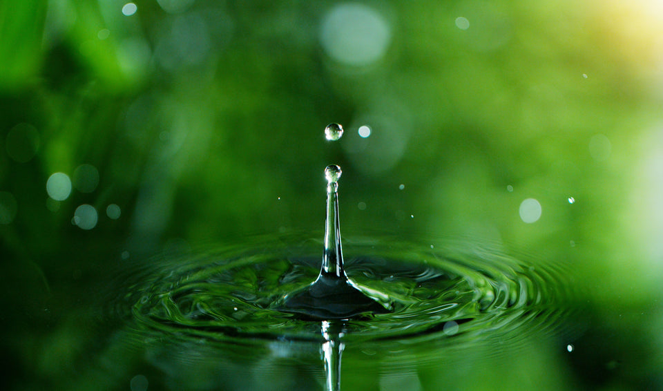 a close up of a drop of water
