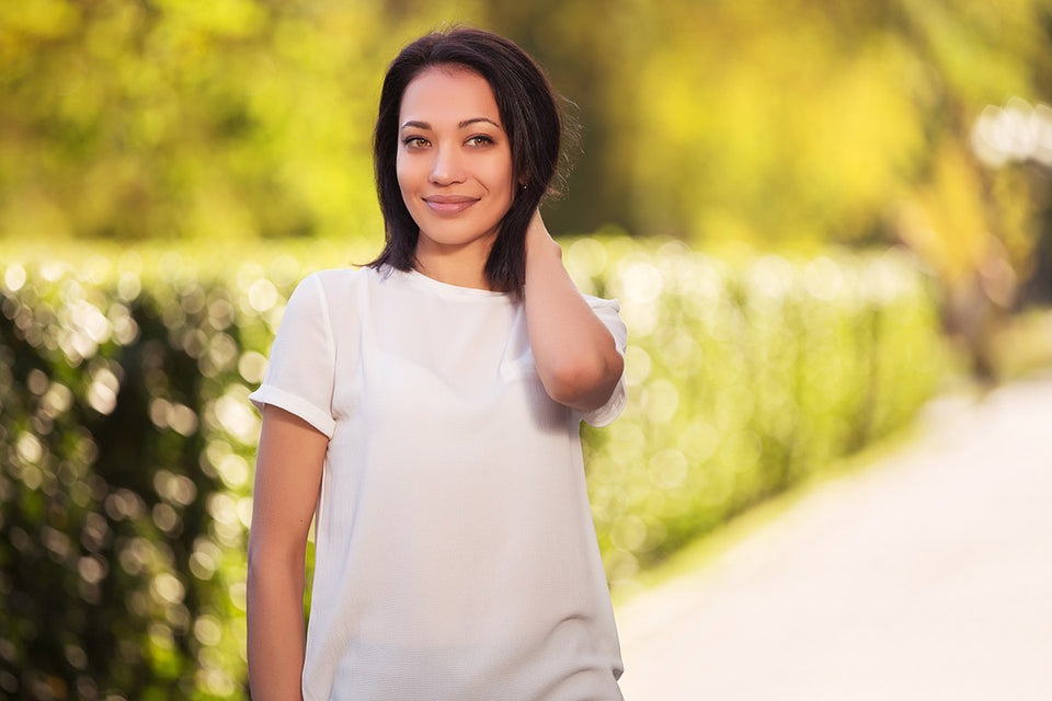 a woman wearing a classic white tee
