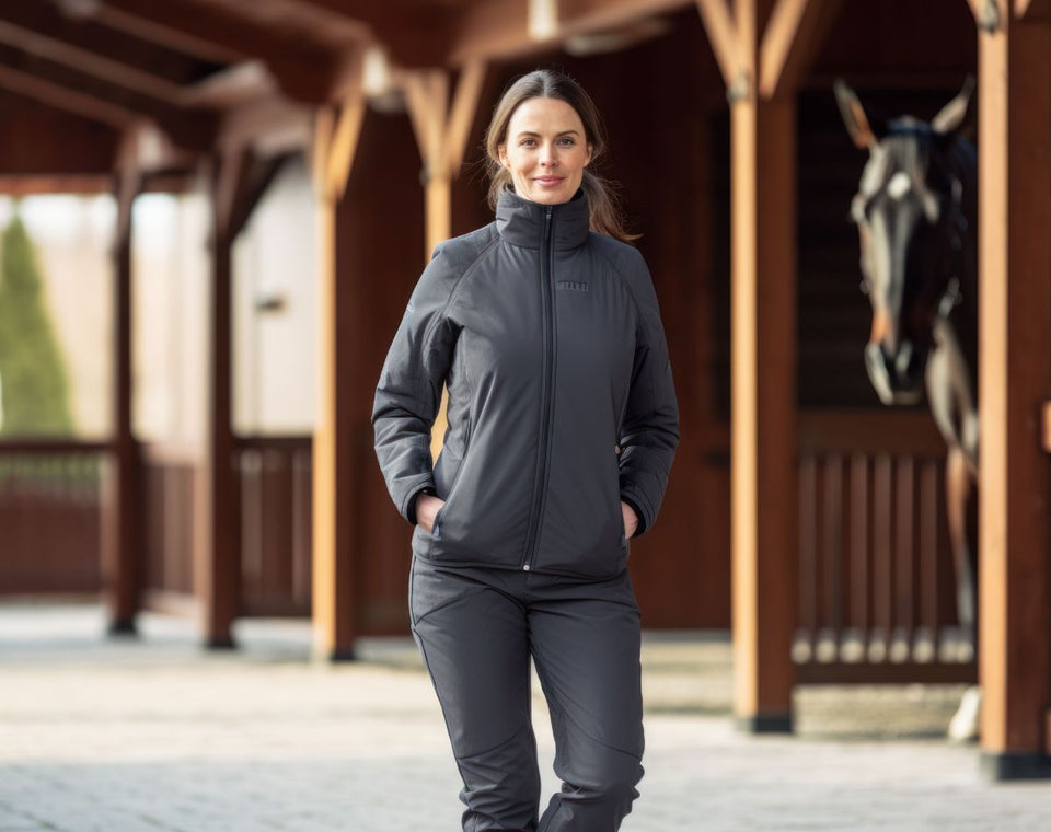 a woman wearing a gray tracksuit