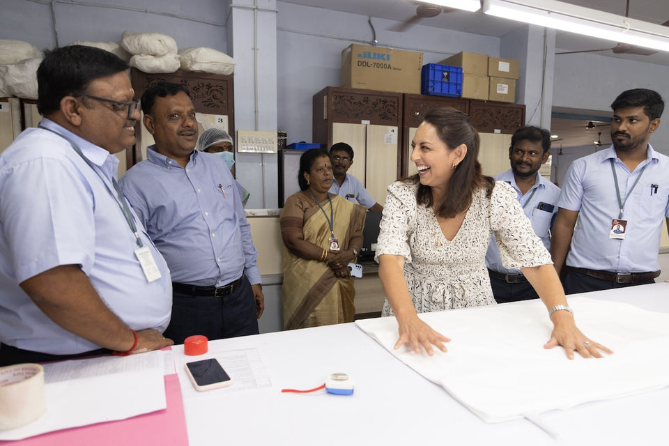 our founder, Karol, working with colleagues at the factory in India