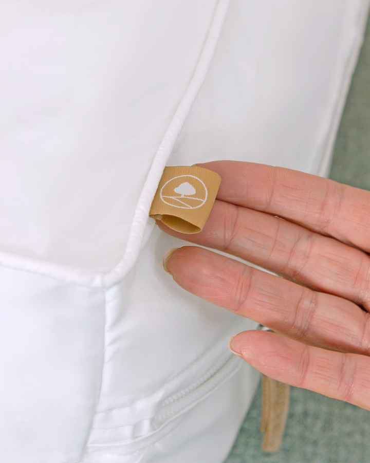 a close up of the Hayden Hill pip on a white storage bag