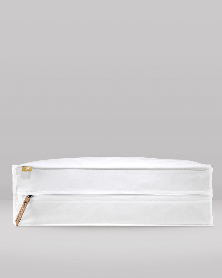 a side view of the leather zipper pull and pip on an extra large storage bag