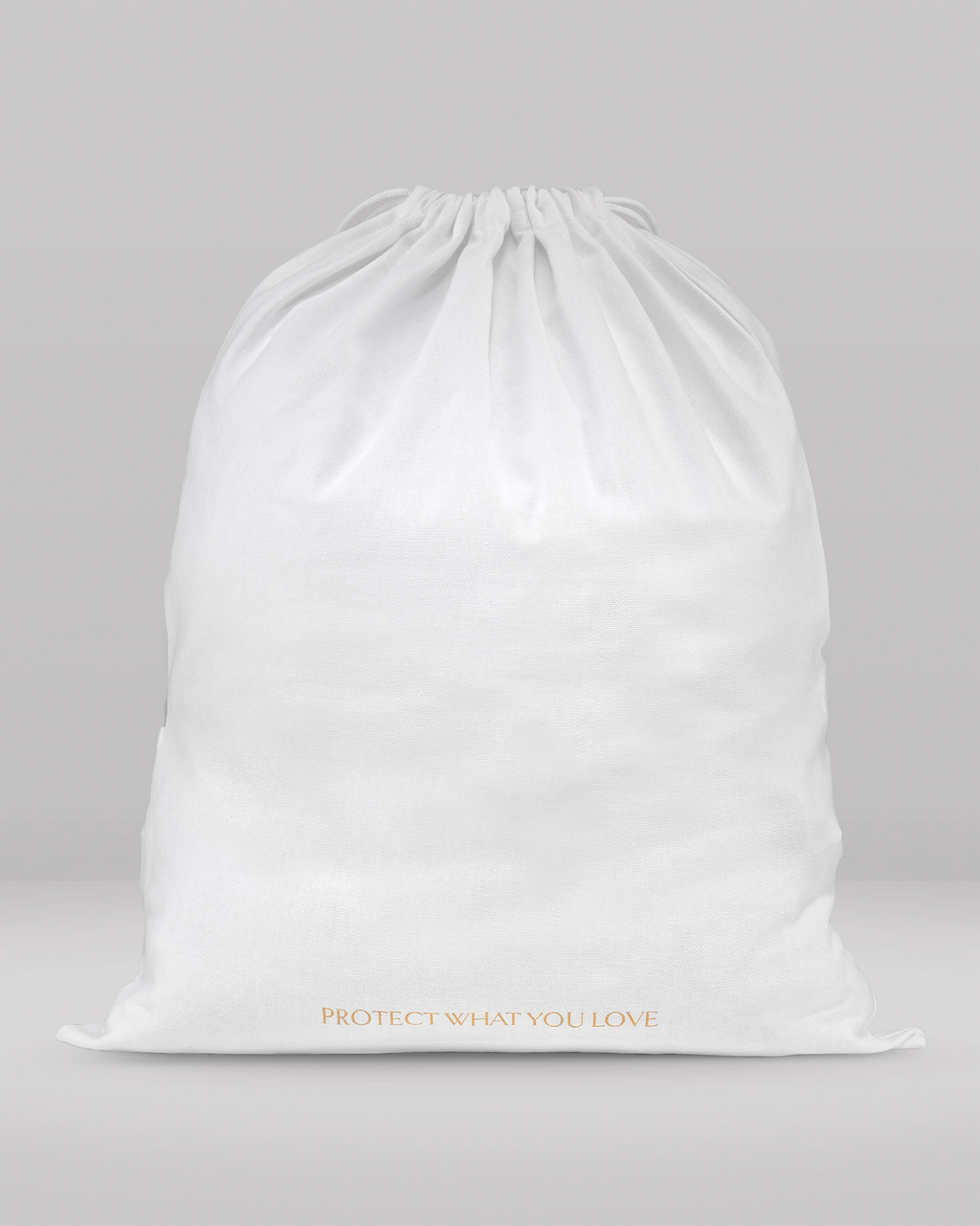 a rear view of a medium size dust bag showing the words 'protect what you love'