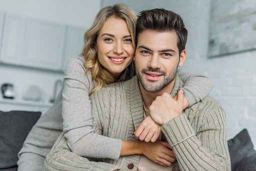 an attractive couple wearing cashmere garments