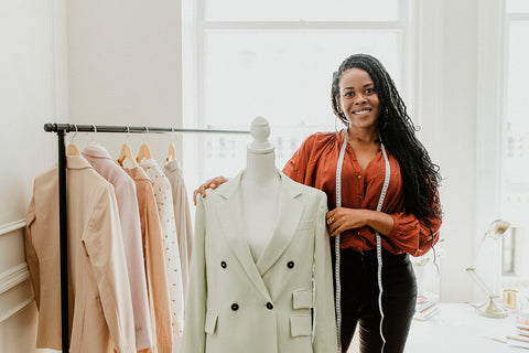 a tailor in her studio