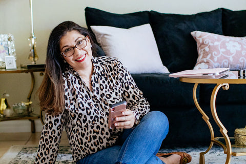 Nathalie at home in her stylish living room