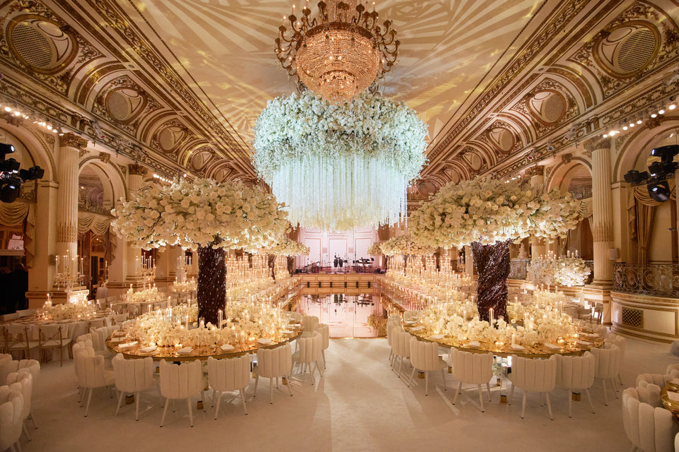 the luxury New York Plaza Hotel ballroom dressed for an exquisite wedding reception