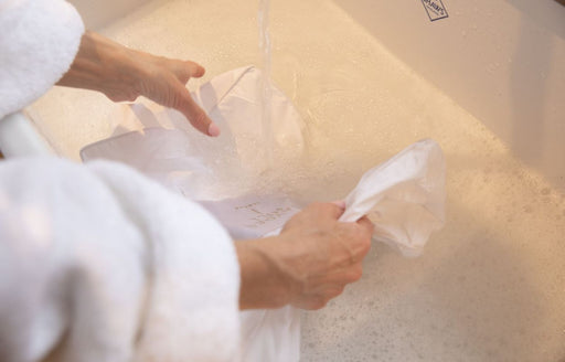 a Hayden Hill Storage Bag being hand washed in gentle detergent