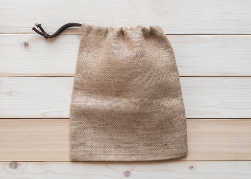 a brown linen drawstring dust bag