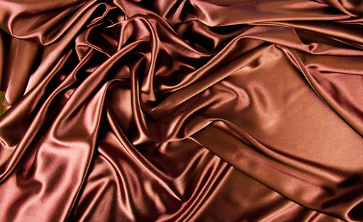 a brown satin piece of material