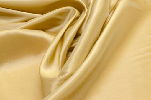 a buttery yellow swathe of acetate material