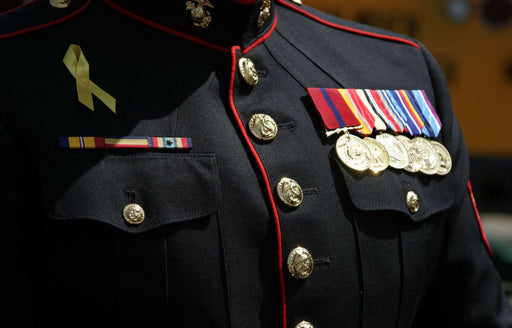 a close up of a military uniform with medals