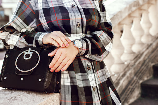 a close up of a tartan patterned shirt dress