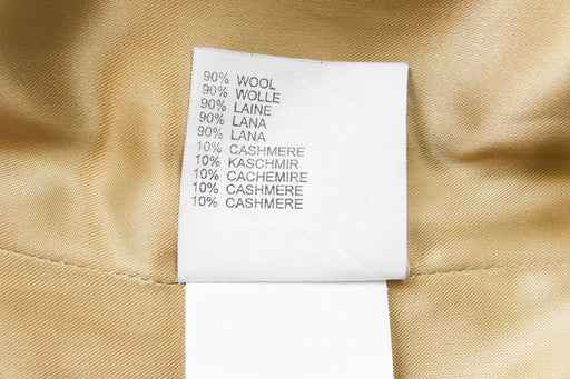 a fabric showing a label that says 90% wool and 10% cashmere