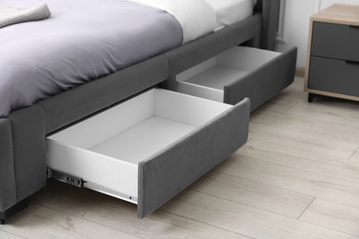 a gray colored bed with under bed storage drawers