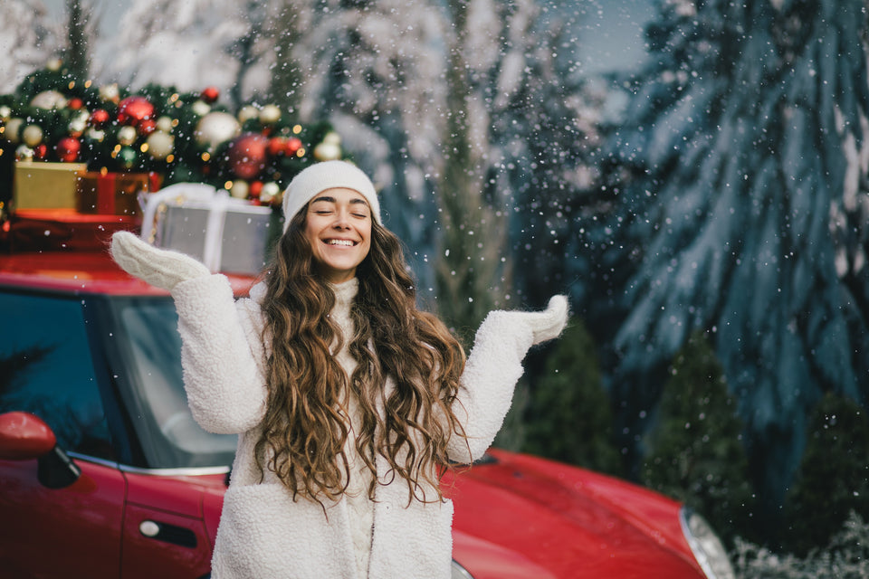 a happy teenager wearing a white fleece cardigan