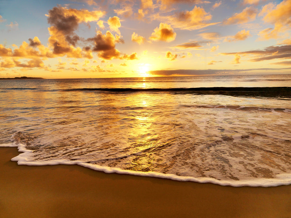 a mellow sunset over a beach