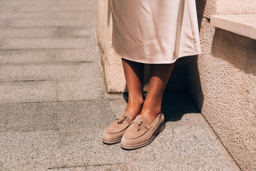 a pair of tassel pale brown suede loafers