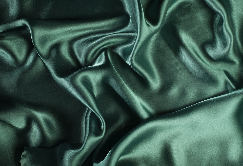 a piece of green satin