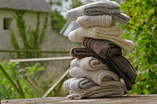 a pile of chunky woolen socks