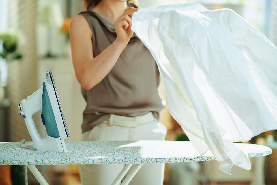 a white shirt being ironed