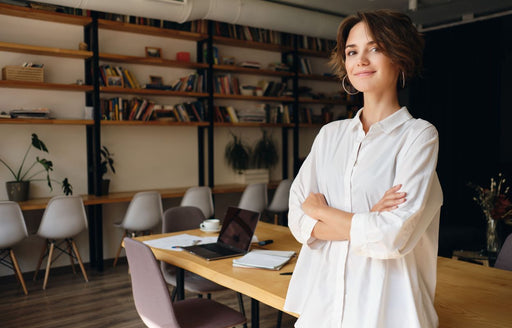 a woman at work wearing a white shirt