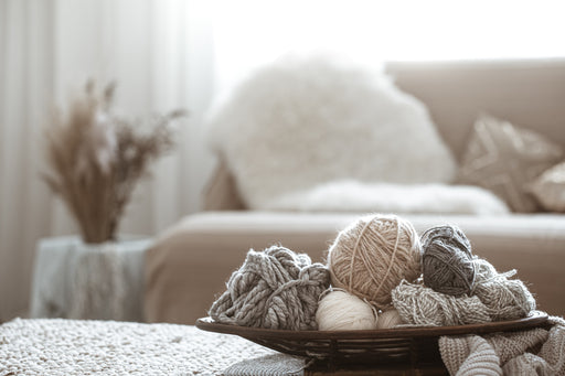 balls of soft wool in a bowl