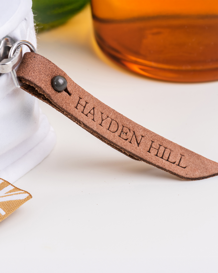 a close up of the Hayden Hill leather zip pull on a storage bag