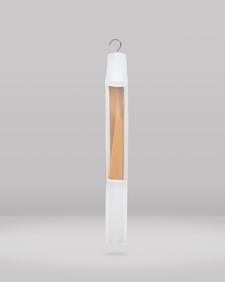a side view of the long hanging garment bag with an organza viewing panel