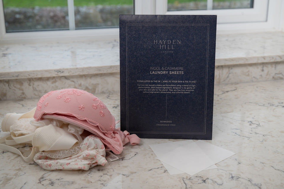 a pack of Hayden Hill laundry sheets next to some underwear